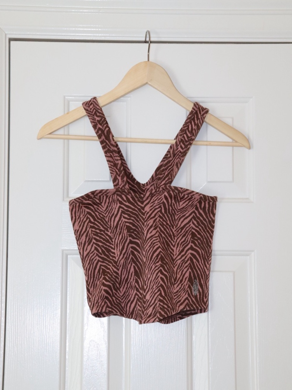 Free People Movement Flutter Kick Workout Tank in brown and pink zebra pattern